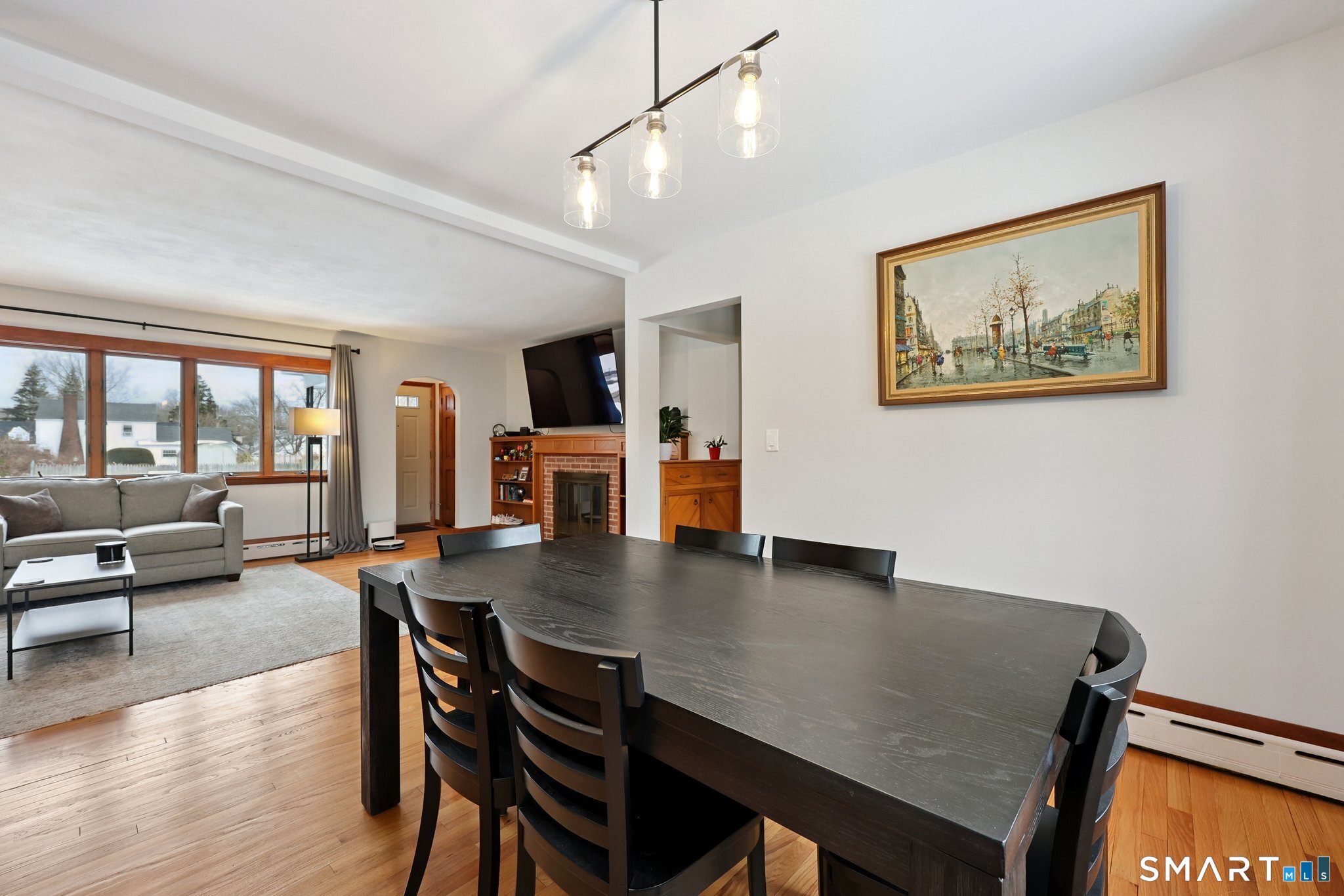 10 Hislop Street New London, CT 06320 - Photo 8 of 25 a view of a dining room with furniture and wooden floor