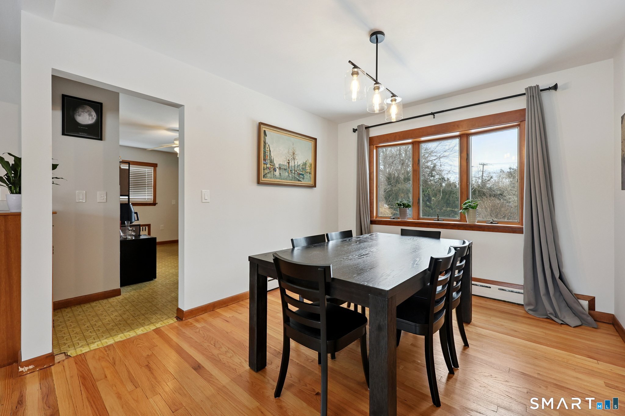 10 Hislop Street New London, CT 06320 - Photo 9 of 25 a view of a dining room with furniture window and wooden floor