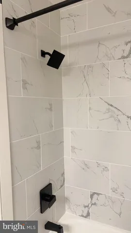 a view of a room that has a window in it