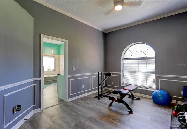 a bathroom with a sink a mirror and a window
