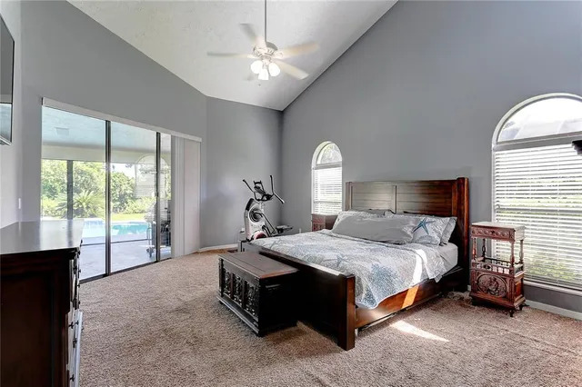 a bathroom with a granite countertop double vanity sink and a mirror