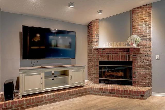 a kitchen with a sink stove and window