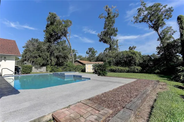 a view of a garden with a houses