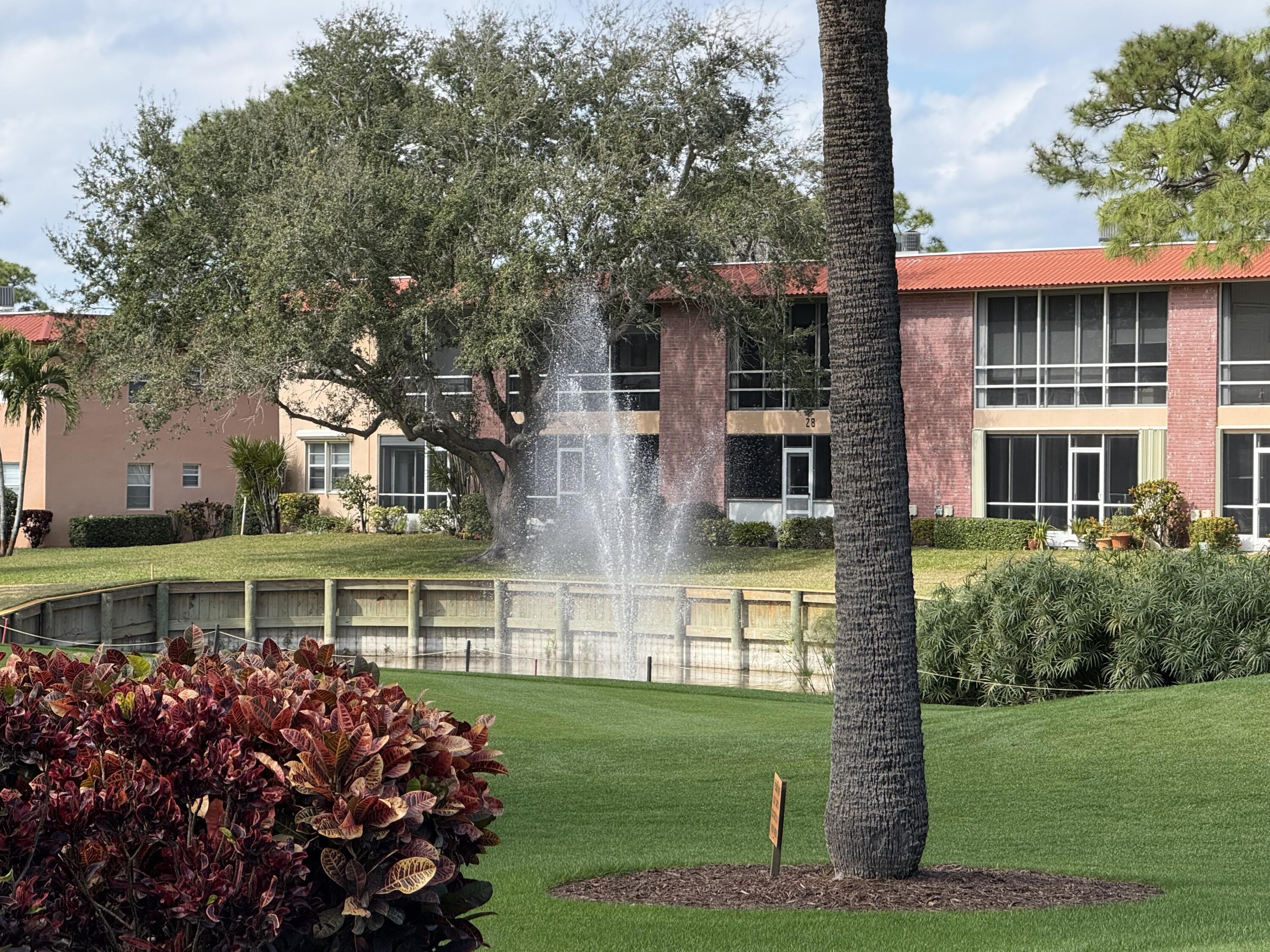 1961 Southwest Palm City Road, Unit 31C Stuart, FL 34994 - Photo 24 of 40 back fountain