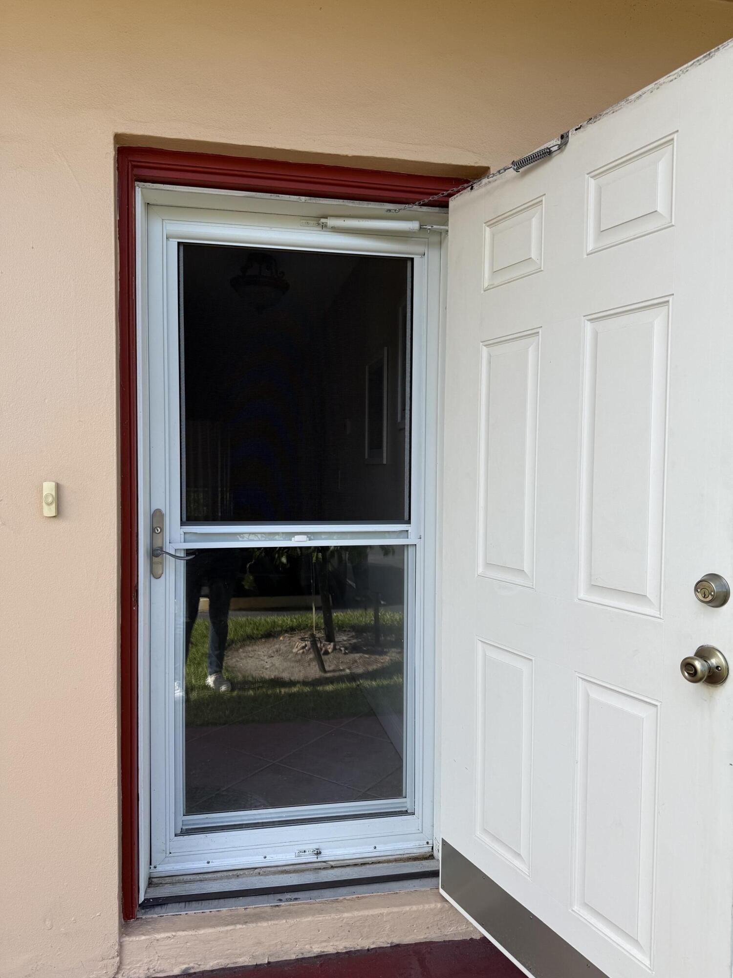 1961 Southwest Palm City Road, Unit 31C Stuart, FL 34994 - Photo 3 of 40 screened door