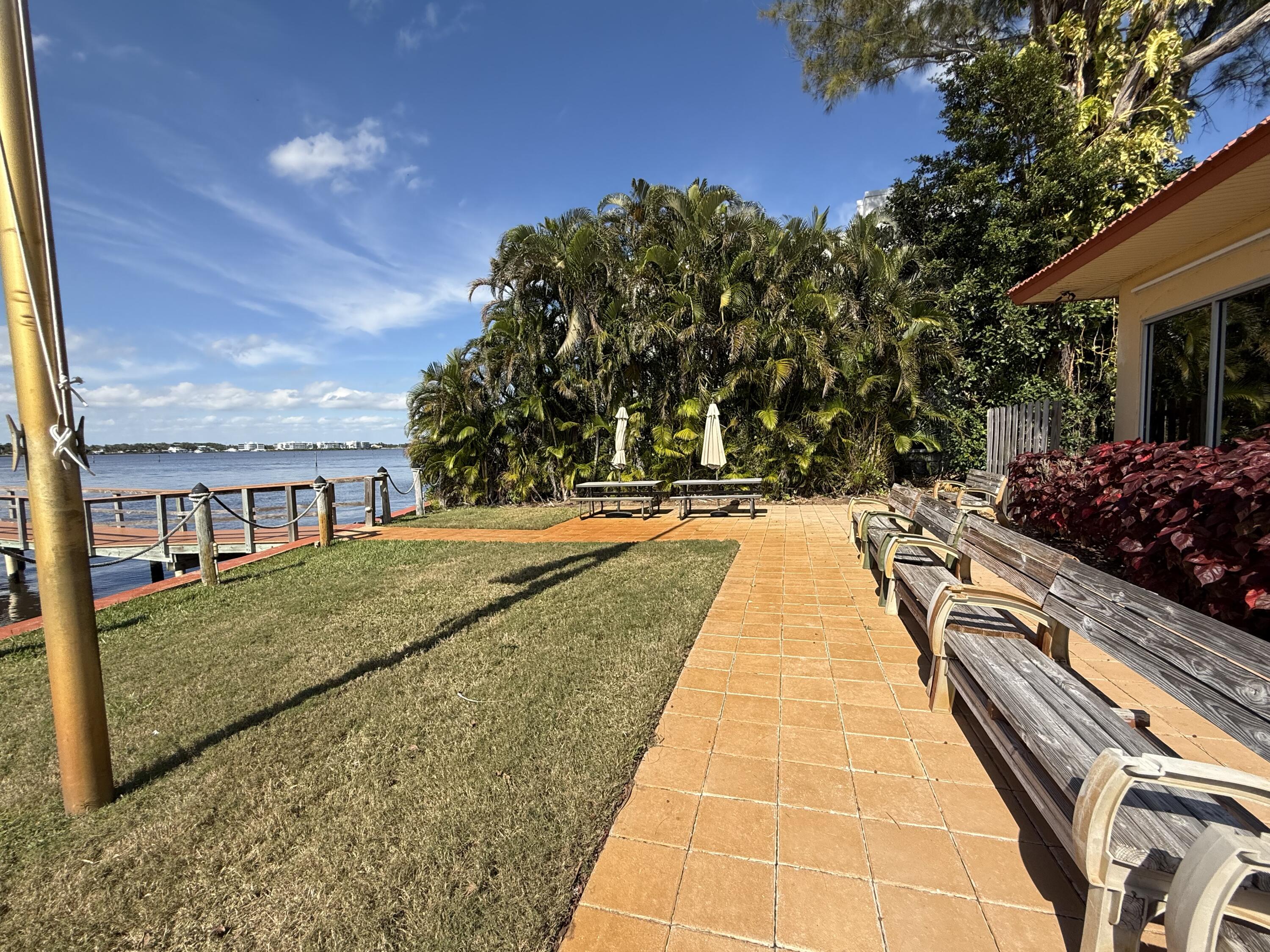 1961 Southwest Palm City Road, Unit 31C Stuart, FL 34994 - Photo 39 of 40 sunset benches