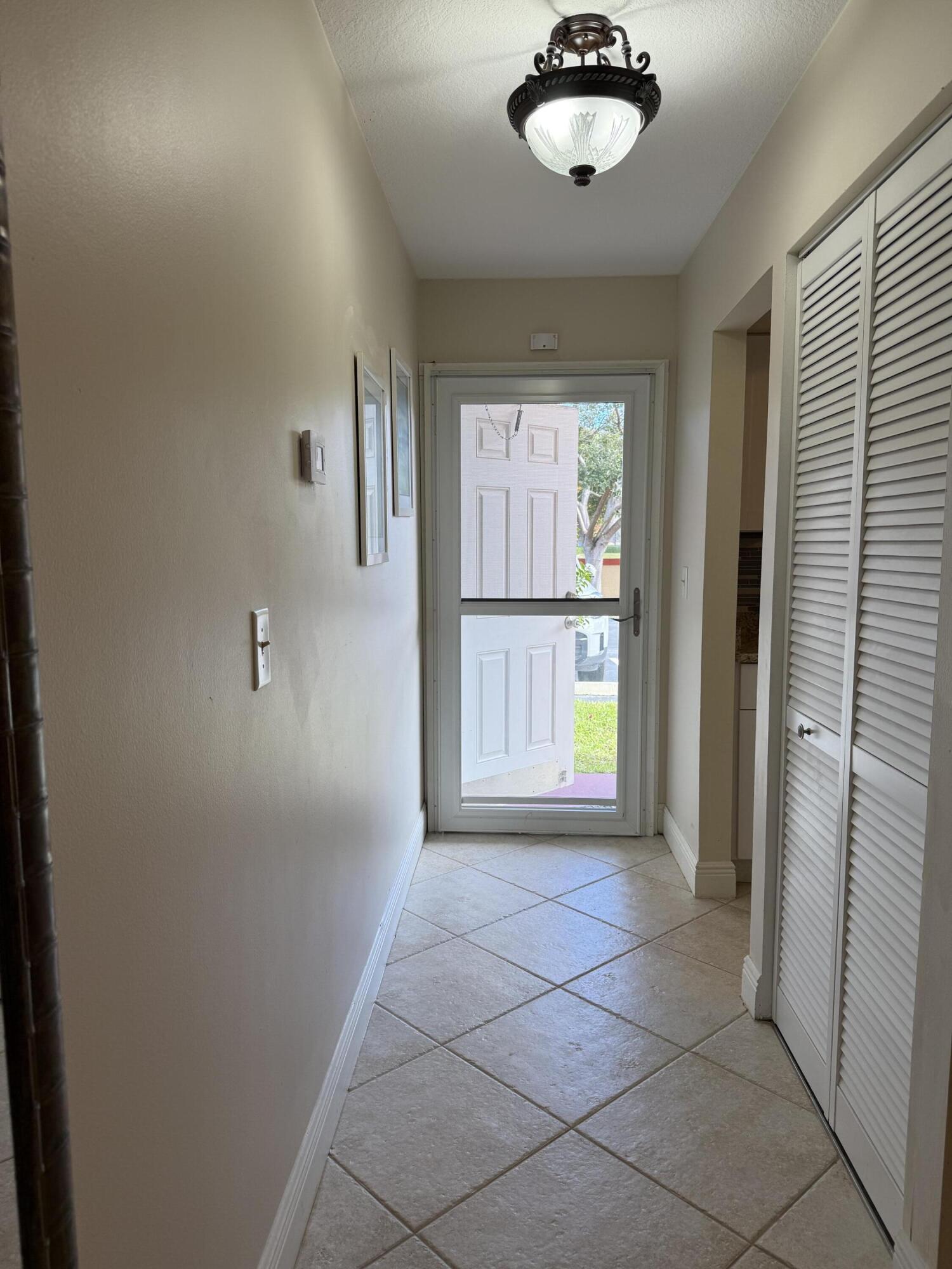 1961 Southwest Palm City Road, Unit 31C Stuart, FL 34994 - Photo 4 of 40 screen door
