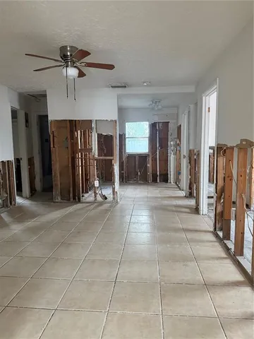 a view of a hallway with seating area