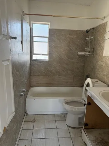 a view of kitchen with furniture and window