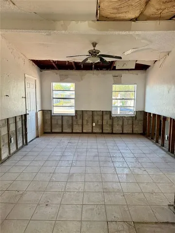 a view of a back yard of a house