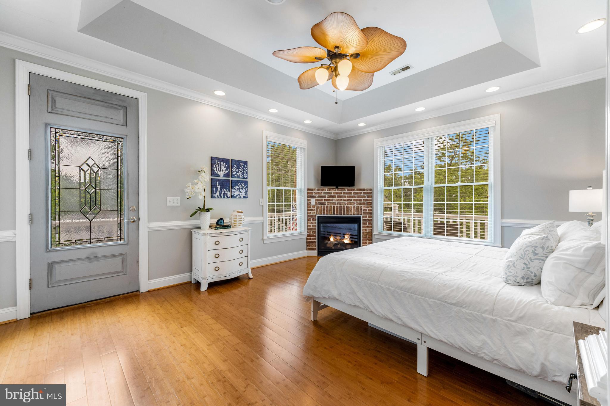 10 Dogwood Road Riva, MD 21140 - Photo 22 of 58 a bedroom with a bed and a chandelier