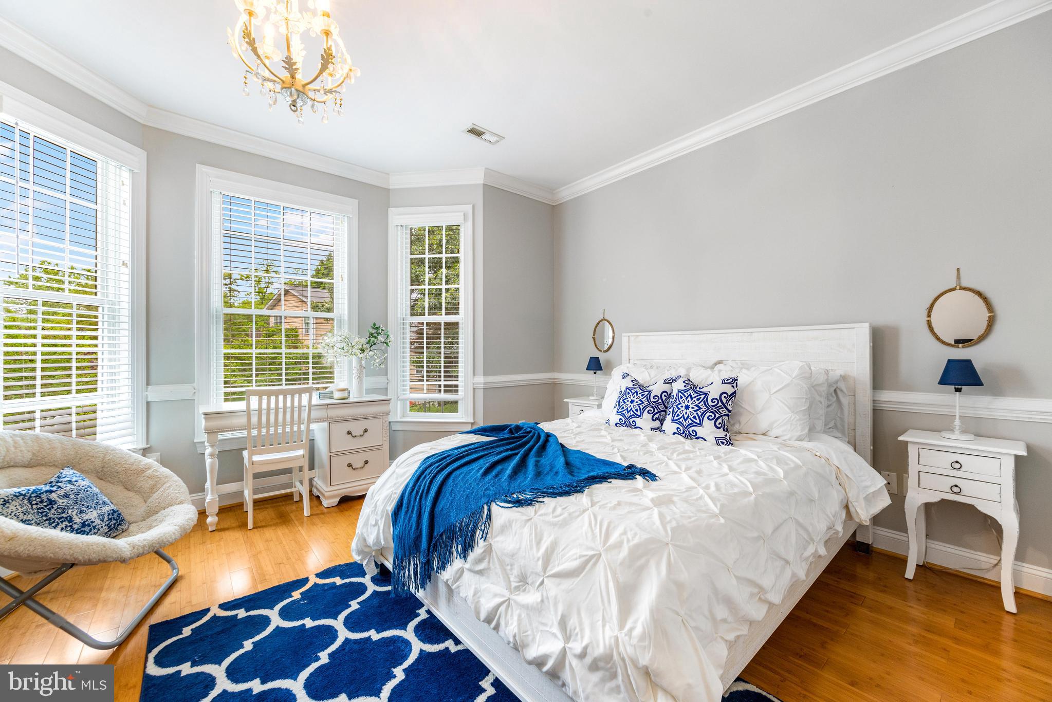 10 Dogwood Road Riva, MD 21140 - Photo 33 of 58 a bedroom with a bed and wooden floor