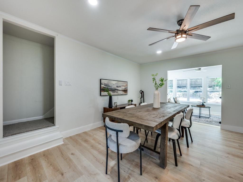 3406 Springwood Lane Dallas, TX 75233 - Photo 15 of 36 a view of a dining room with furniture