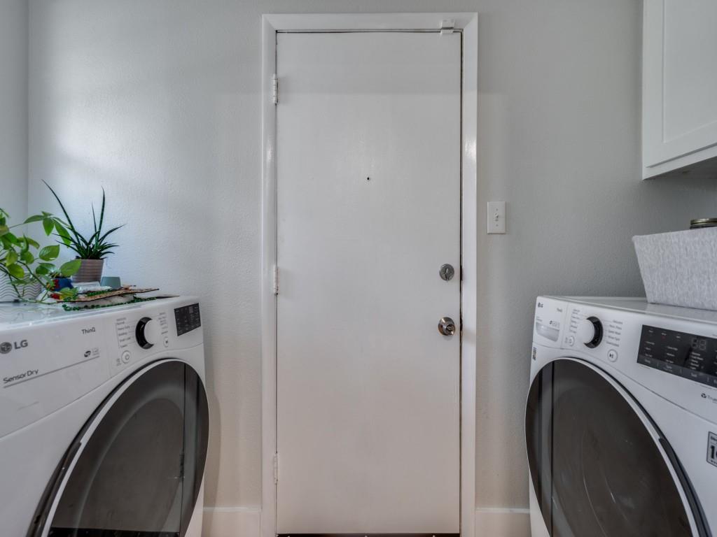 3406 Springwood Lane Dallas, TX 75233 - Photo 20 of 36 a utility room with sink dryer and washer