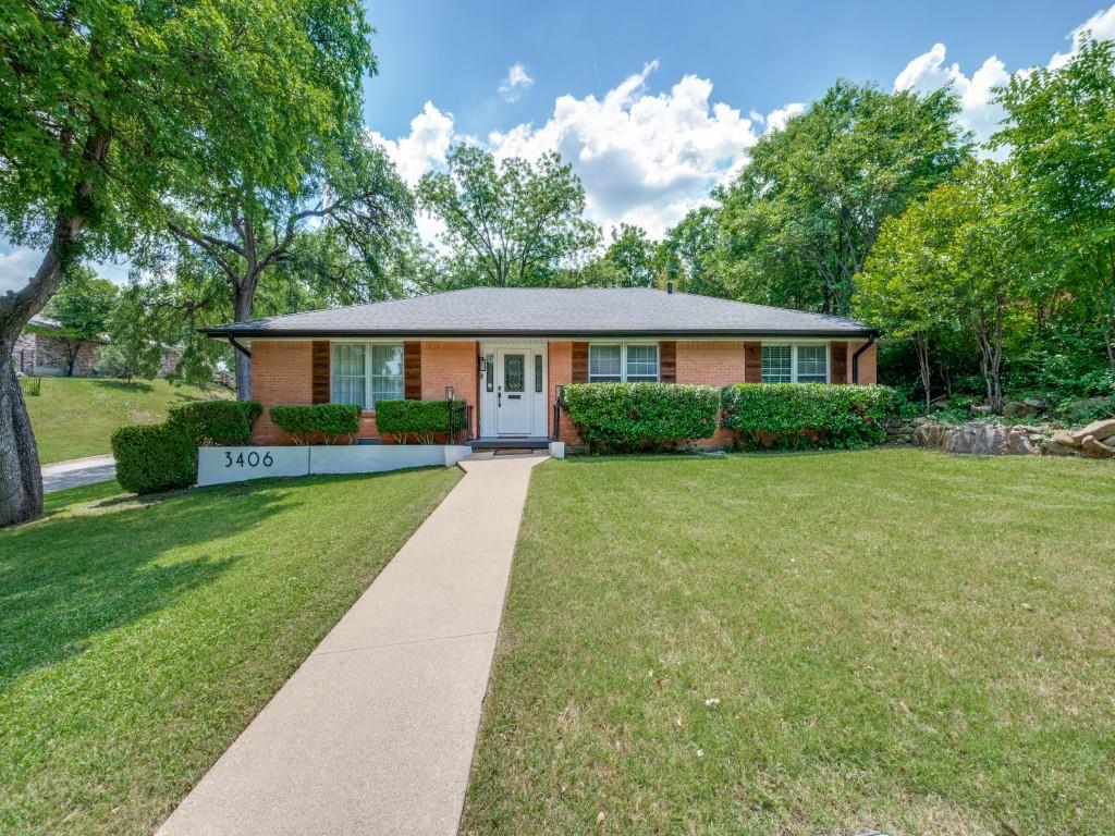3406 Springwood Lane Dallas, TX 75233 - Photo 3 of 36 a view of house with a big yard and potted plants