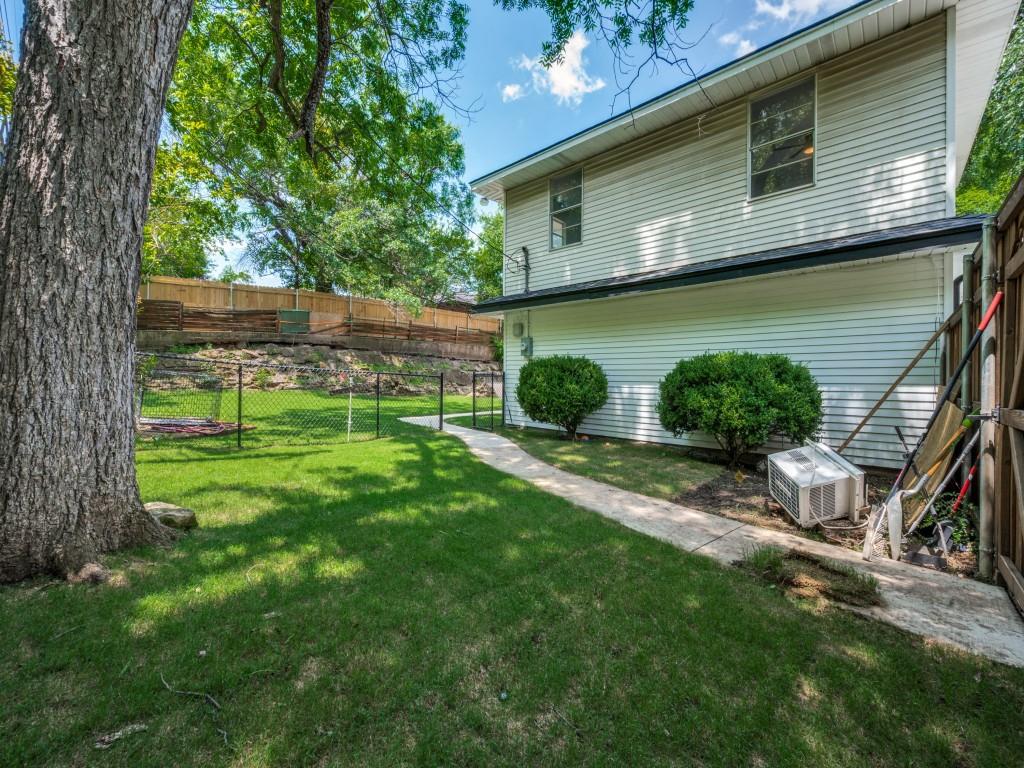 3406 Springwood Lane Dallas, TX 75233 - Photo 36 of 36 a view of backyard with a garden and plants