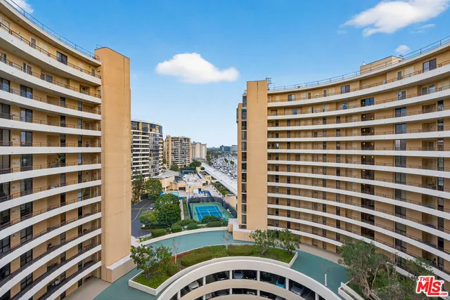 a front view of a building with a street