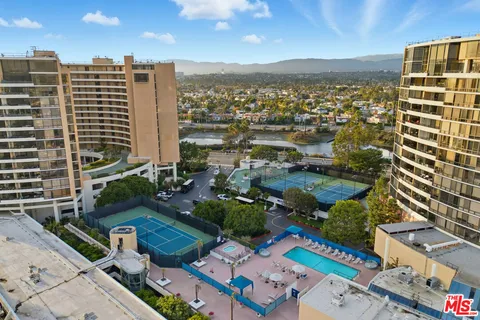 a view of a city with tall buildings