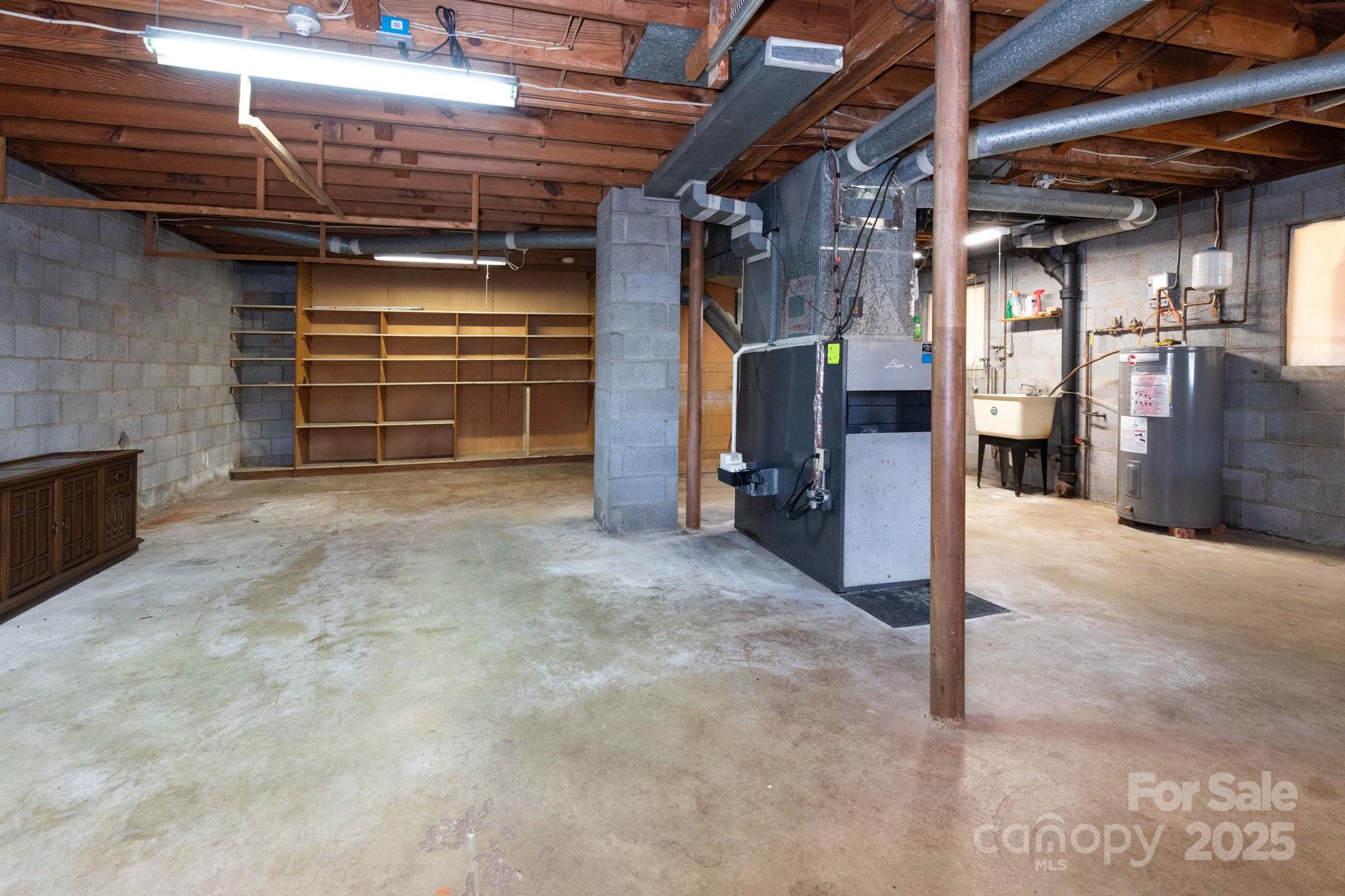 66 Gibson Road Asheville, NC 28804 - Photo 18 of 26 a view of empty room with wooden ceiling
