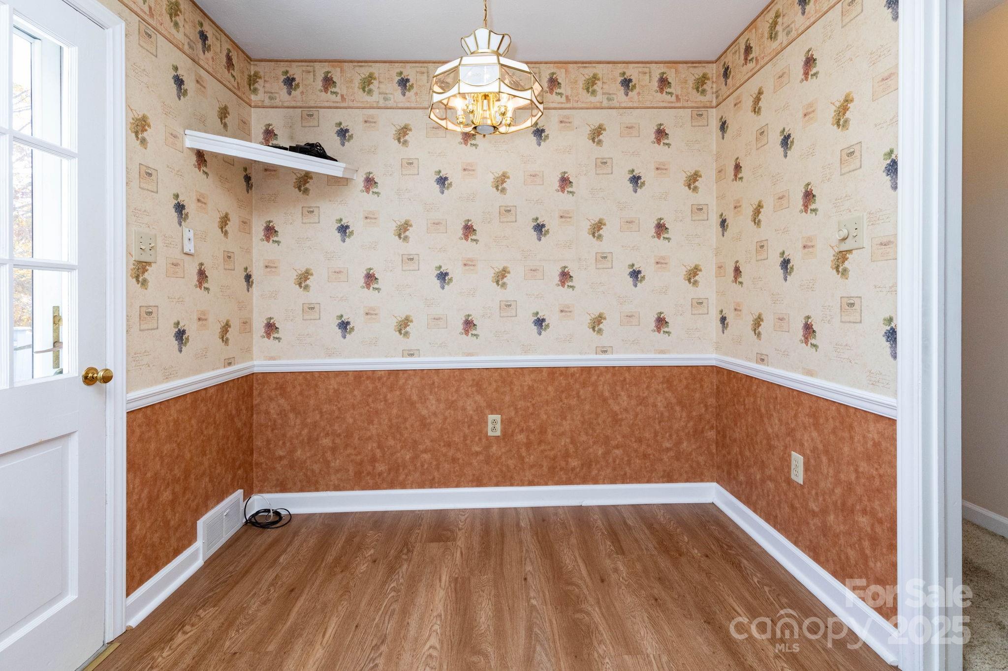 66 Gibson Road Asheville, NC 28804 - Photo 8 of 26 a view of an empty room with a window