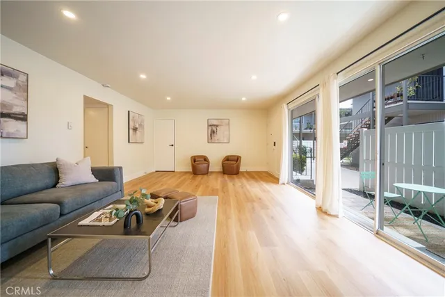 a living room with furniture and a table