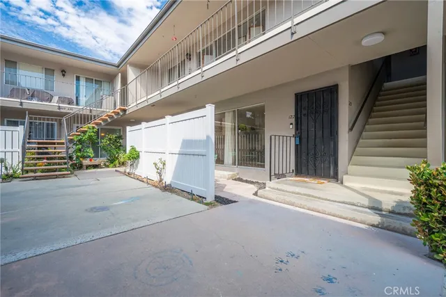 a view of a house with a street
