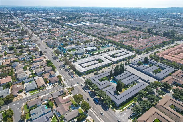 an aerial view of a city with lots of residential buildings