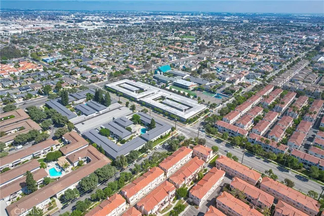 an aerial view of a city with lots of residential buildings