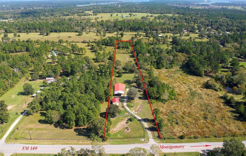Fantastic 4.49 unrestricted acres near downtown Montgomery and the little league baseball fields. A barn and a metal building with kitchen and bathroom are on the front portion of the property. Build your dream home in the middle or find a great use for this property!