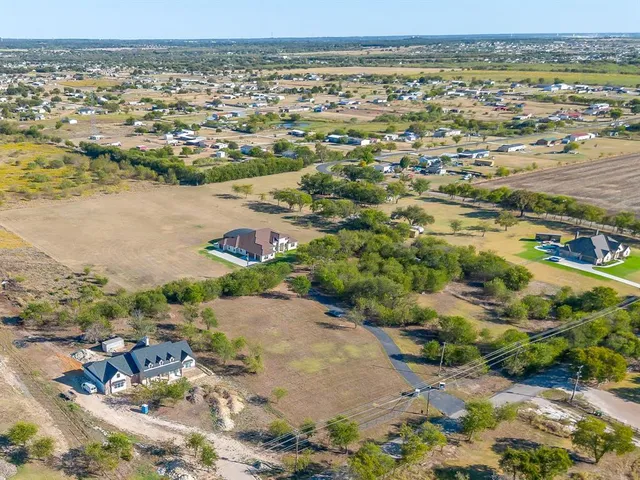 a view of a garden with a fountain