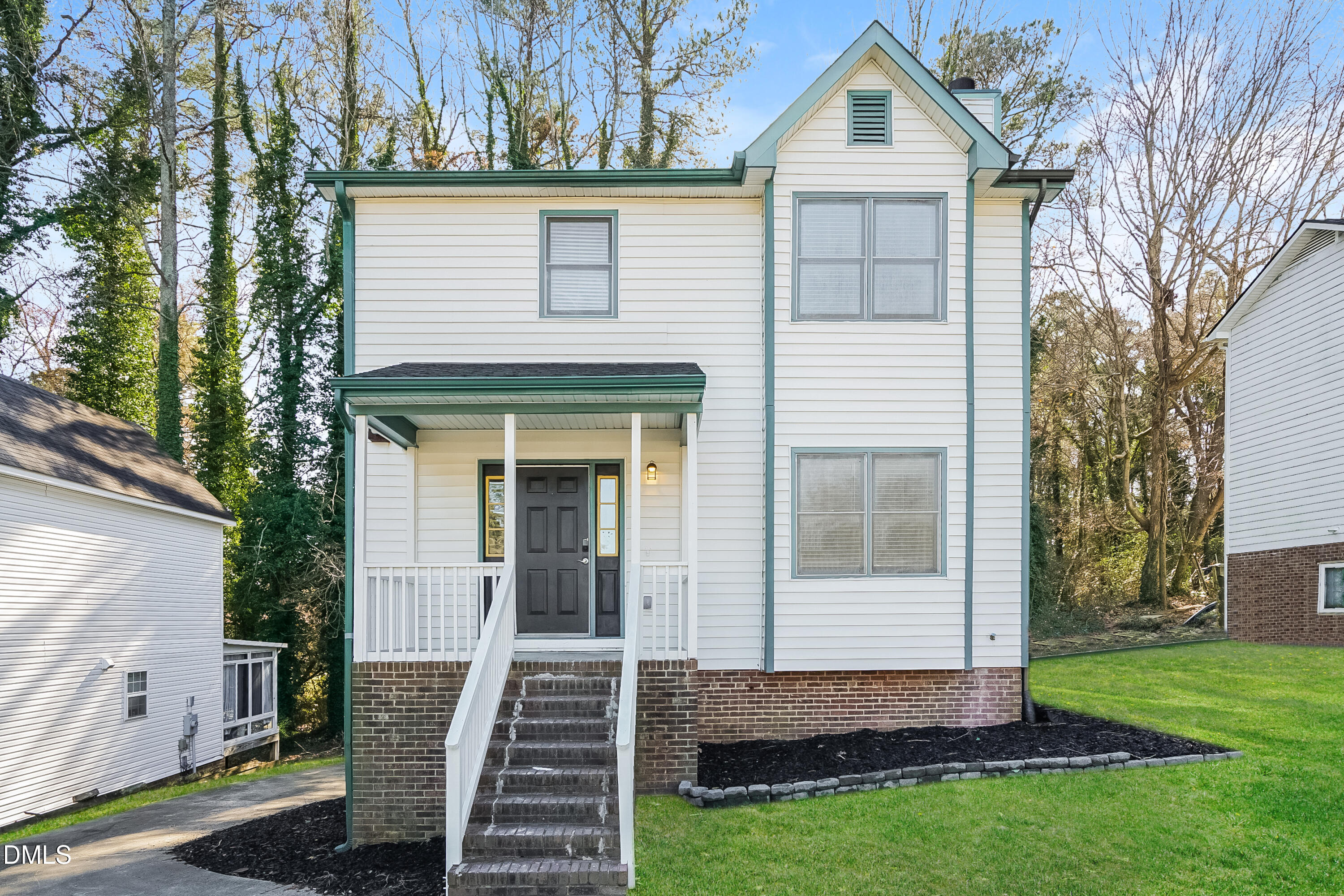 849 Rawls Drive Raleigh, NC 27610 - Photo 1 of 18 a front view of a house with a yard