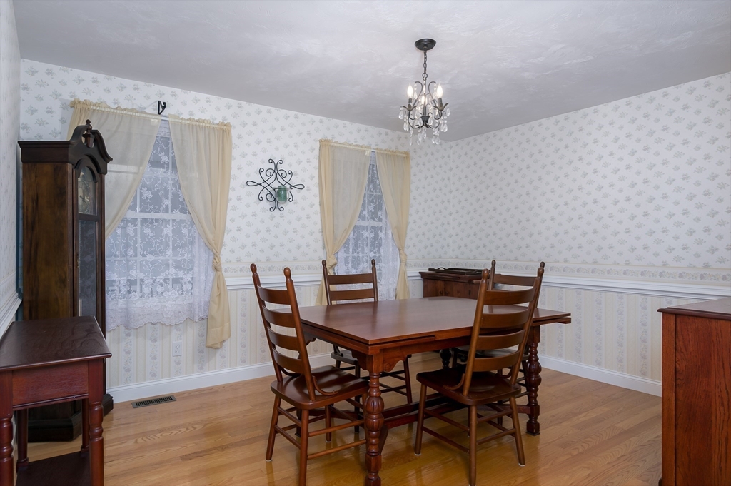 6 Nates Way Rutland, MA 01543 - Photo 11 of 31 a view of a dining room with furniture and wooden floor