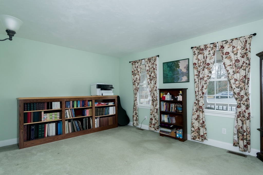 6 Nates Way Rutland, MA 01543 - Photo 16 of 31 a room with furniture and a book shelf