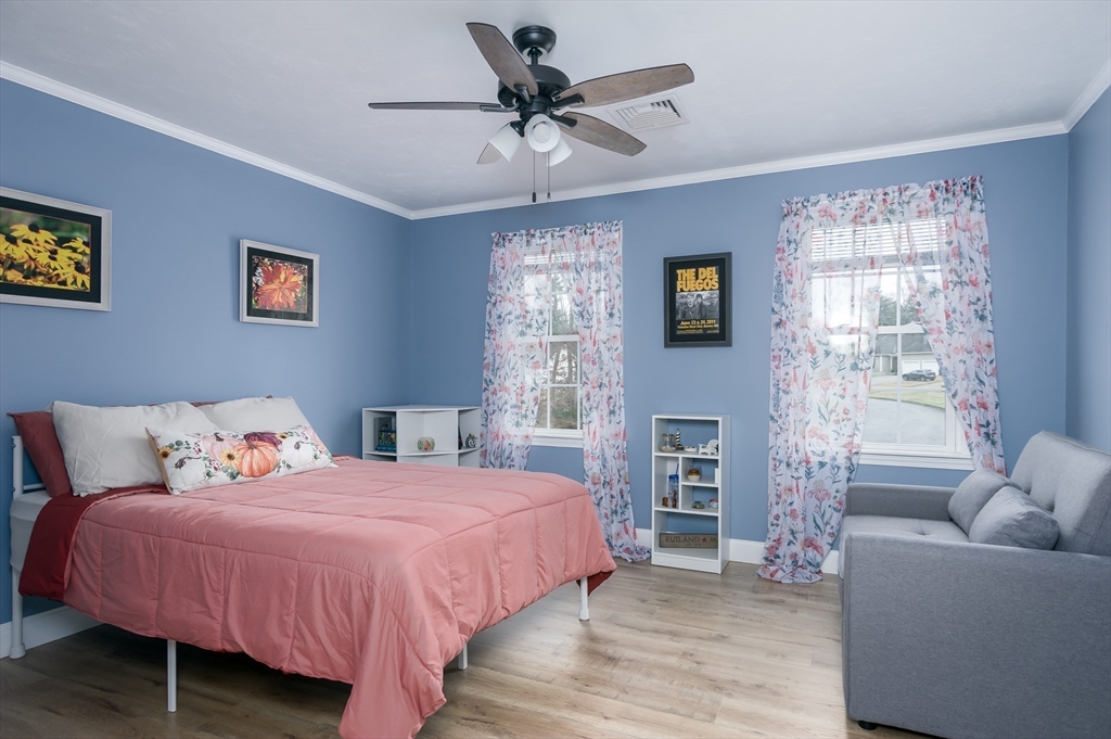 6 Nates Way Rutland, MA 01543 - Photo 18 of 31 a bedroom with a bed and a couch