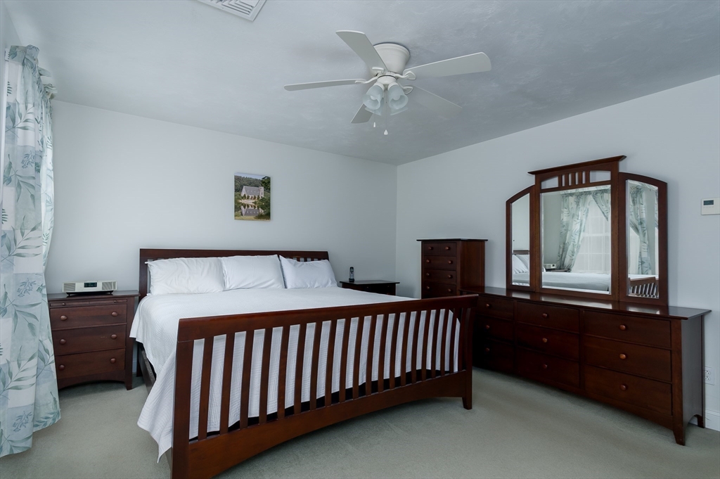6 Nates Way Rutland, MA 01543 - Photo 20 of 31 a bedroom with a bed and a large window