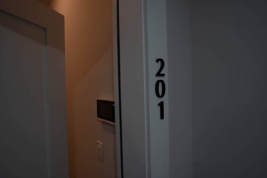 157 Everett Street, Unit 201 Boston, MA 02134 - Photo 8 of 8 a bathroom with a shower