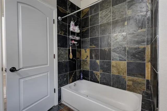 a bathroom with a bathtub