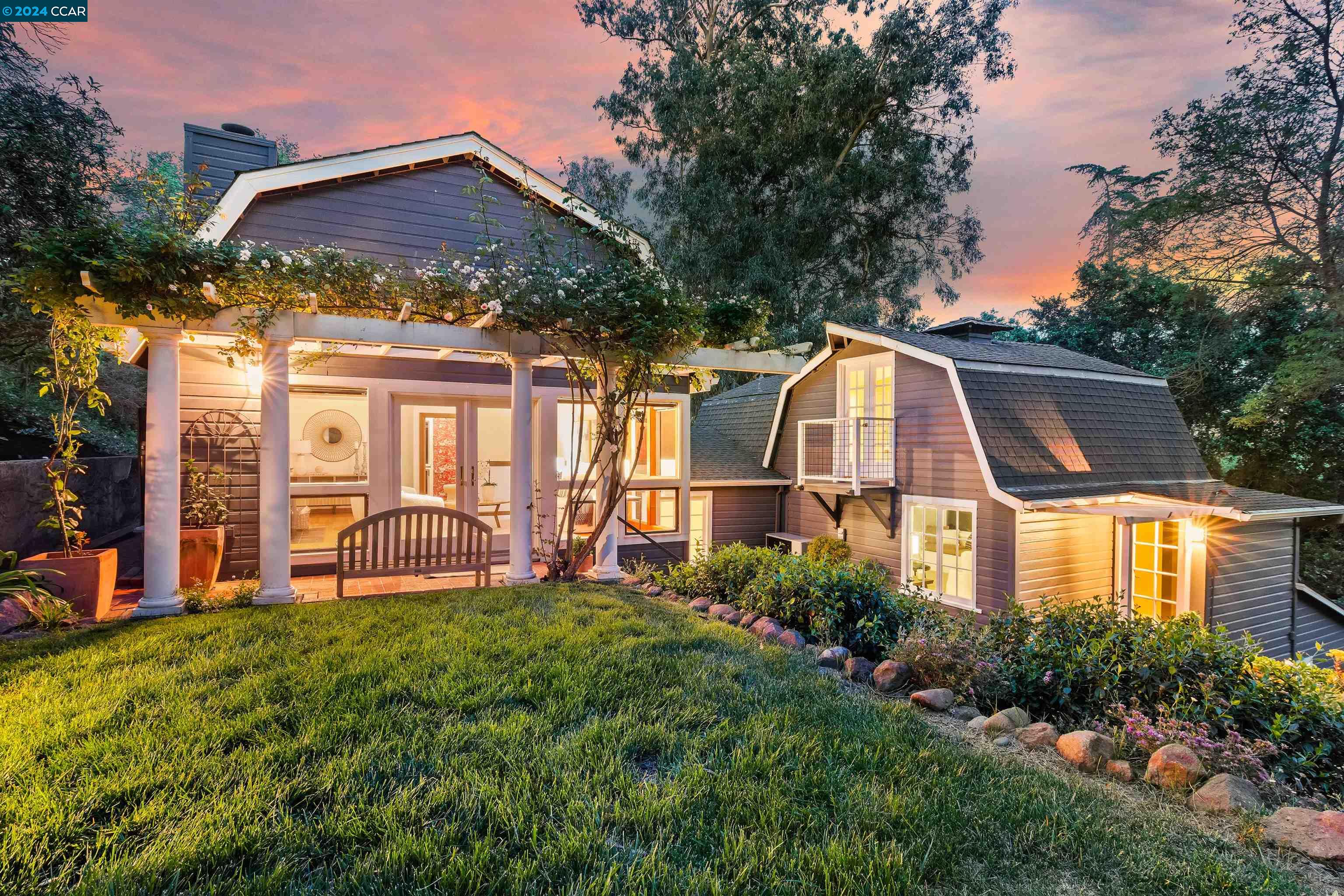 1603 Reliez Valley Road Lafayette, CA 94549 - Photo 1 of 1 a front view of house with a garden