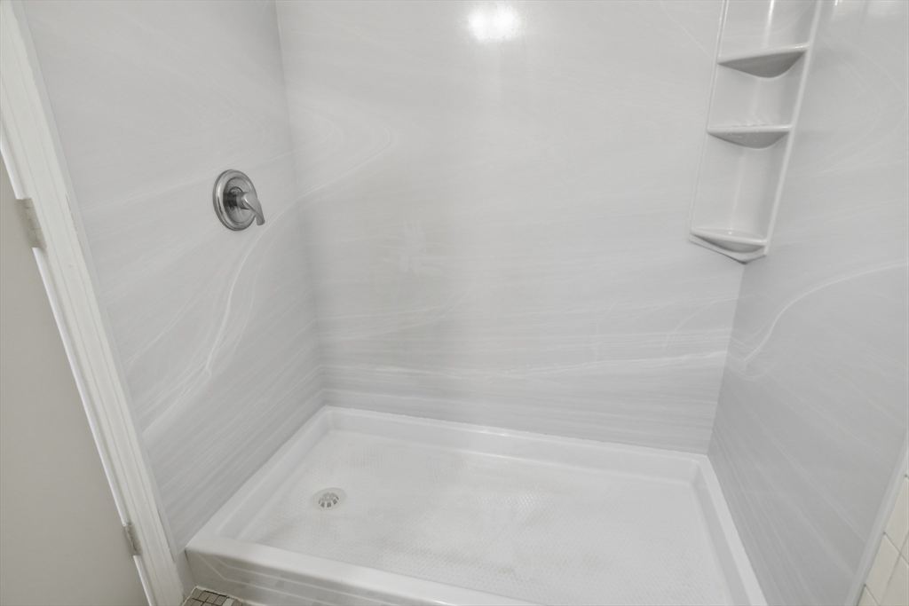 74 Barrett Street, Unit 308 Northampton, MA 01060 - Photo 13 of 22 a close up of a bathtub