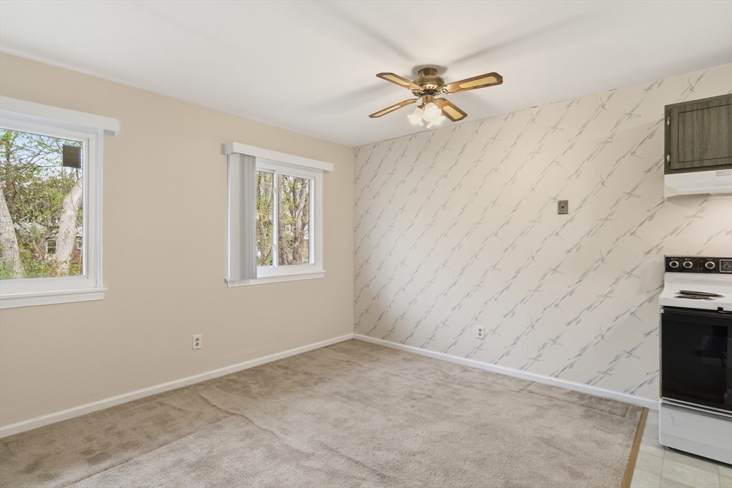 74 Barrett Street, Unit 308 Northampton, MA 01060 - Photo 9 of 22 a view of an empty room with a window