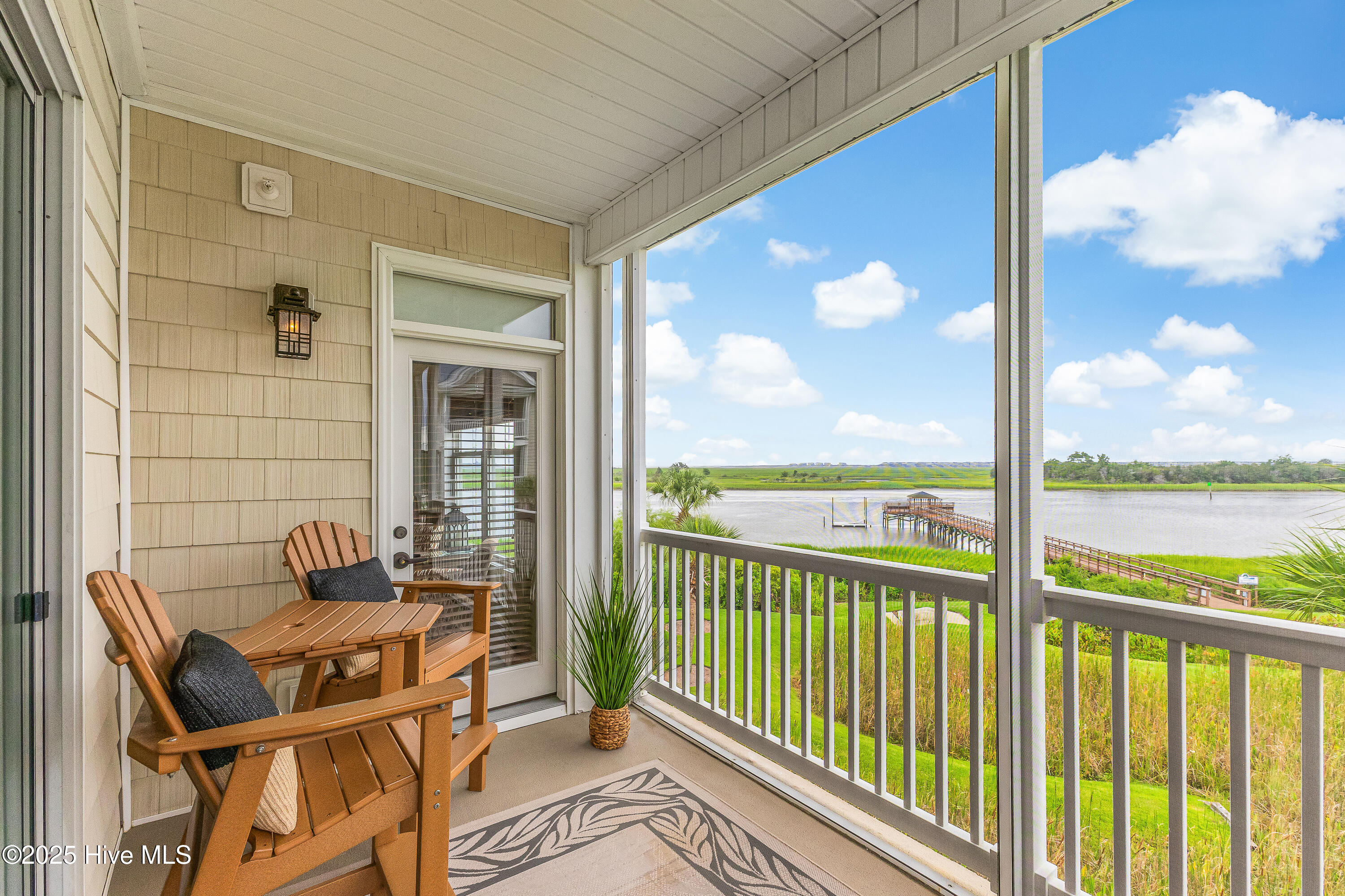 1135 Park Road Southwest, Unit 4201 Sunset Beach, NC 28468 - Photo 27 of 51 Sit and watch the boats go by!