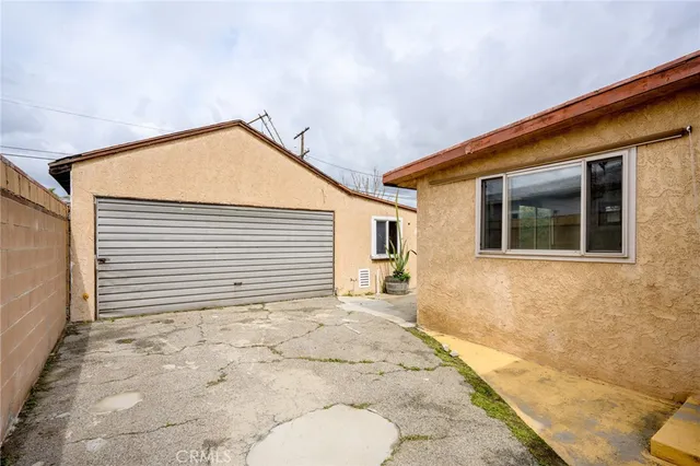 a view of a room with wooden walls