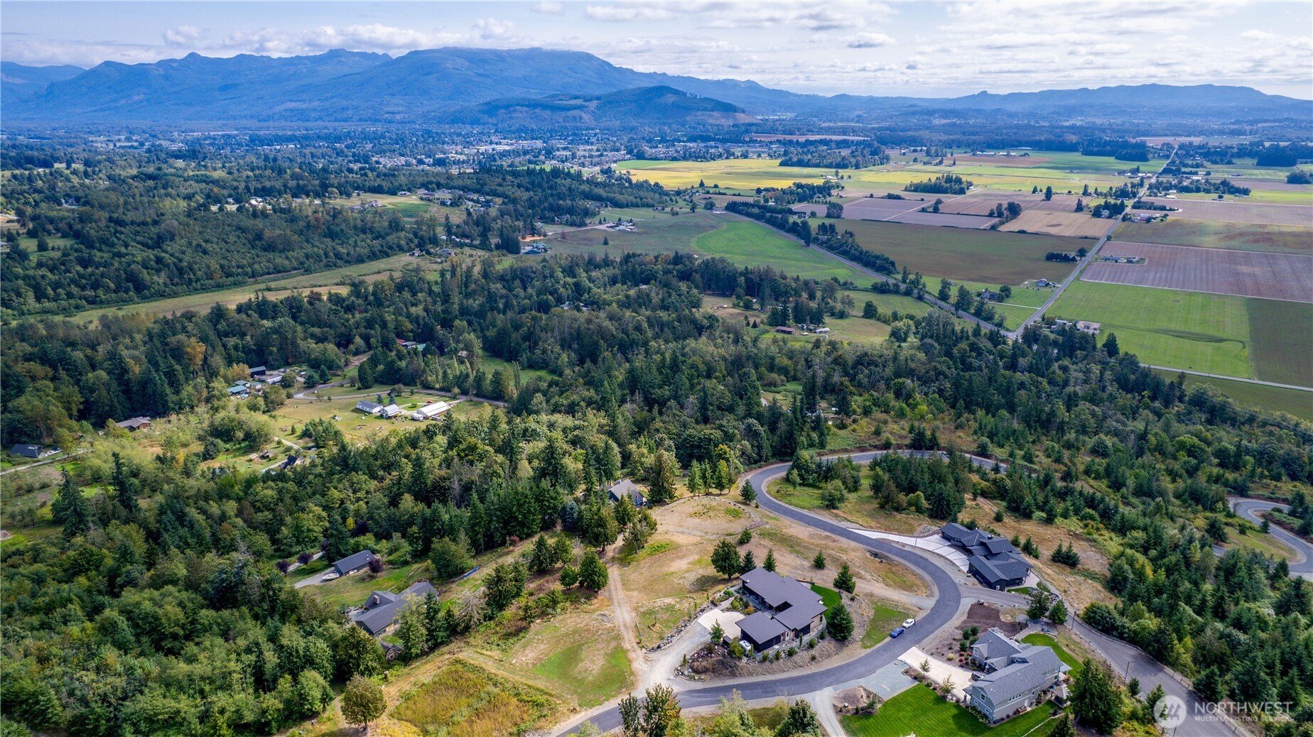 7583 Avalon Heights Way Sedro-Woolley, WA 98284 - Photo 12 of 28 an aerial view of a house with garden space and outdoor seating