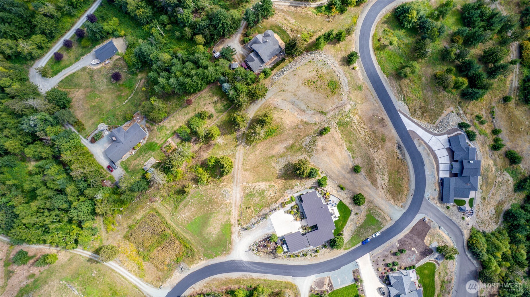 7583 Avalon Heights Way Sedro-Woolley, WA 98284 - Photo 13 of 28 an aerial view of a house with a swimming pool
