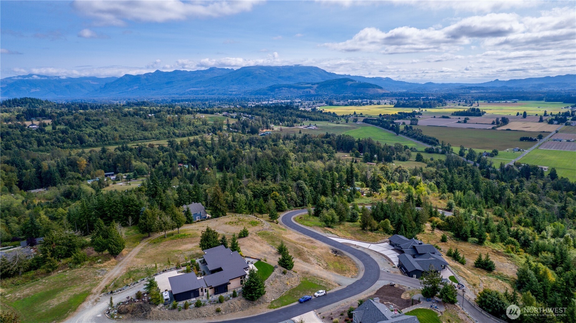 7583 Avalon Heights Way Sedro-Woolley, WA 98284 - Photo 16 of 28 a view of a couches in a backyard