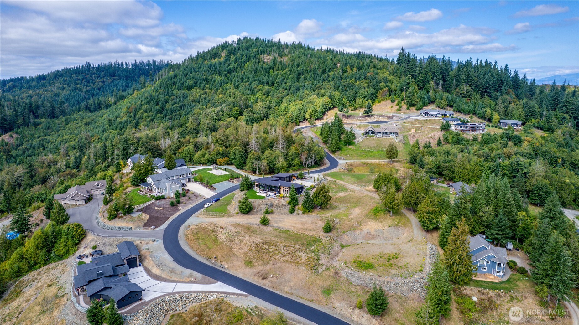 7583 Avalon Heights Way Sedro-Woolley, WA 98284 - Photo 21 of 28 an aerial view of a house with a yard basket ball court and outdoor seating