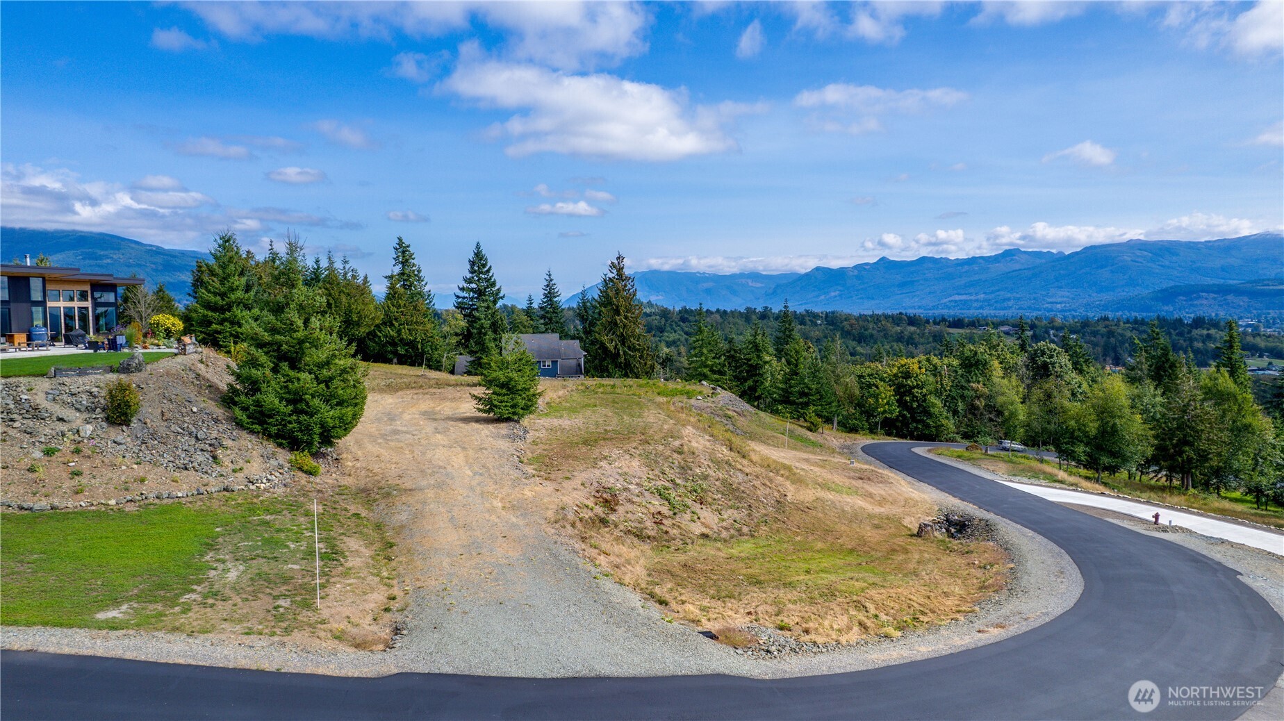 7583 Avalon Heights Way Sedro-Woolley, WA 98284 - Photo 4 of 28 a view of a swimming pool with a yard