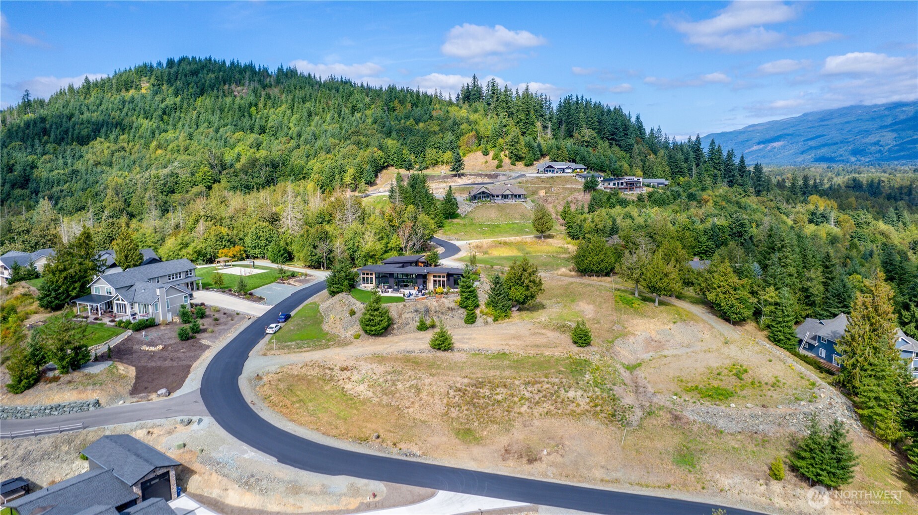 7583 Avalon Heights Way Sedro-Woolley, WA 98284 - Photo 7 of 28 a view of a backyard with sitting area