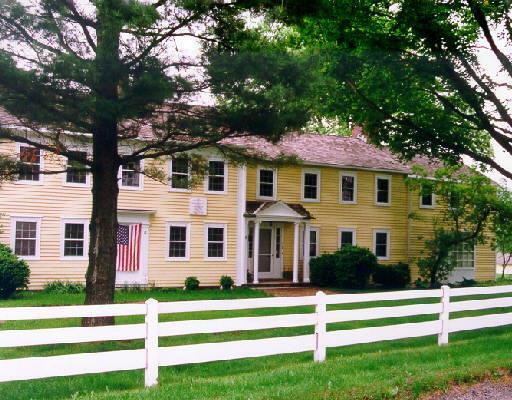 11 Old Stagecoach Road Ridgefield, CT 06877 - Photo 1 of 1 a front view of a house with a yard