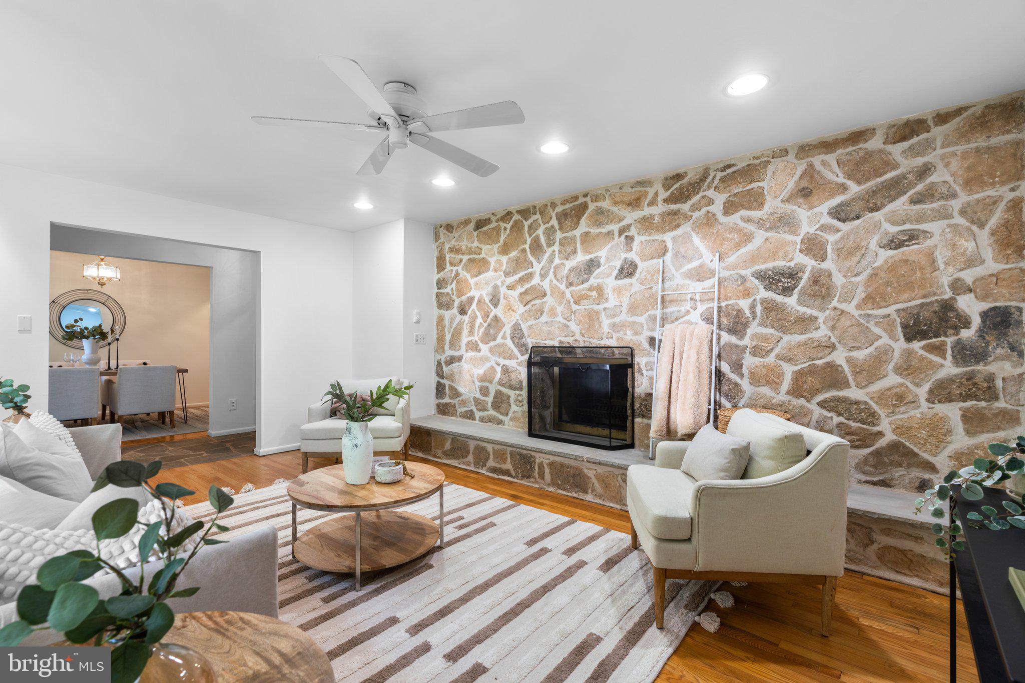 12412 Hall Shop Road Fulton, MD 20759 - Photo 13 of 97 Main level; living room w/ 1 of 3 fireplaces.